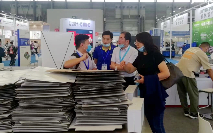 新印自動片穿提手機在上海電子商務包裝展受關注